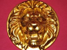 BETRAYING THE LION GOLD FACE